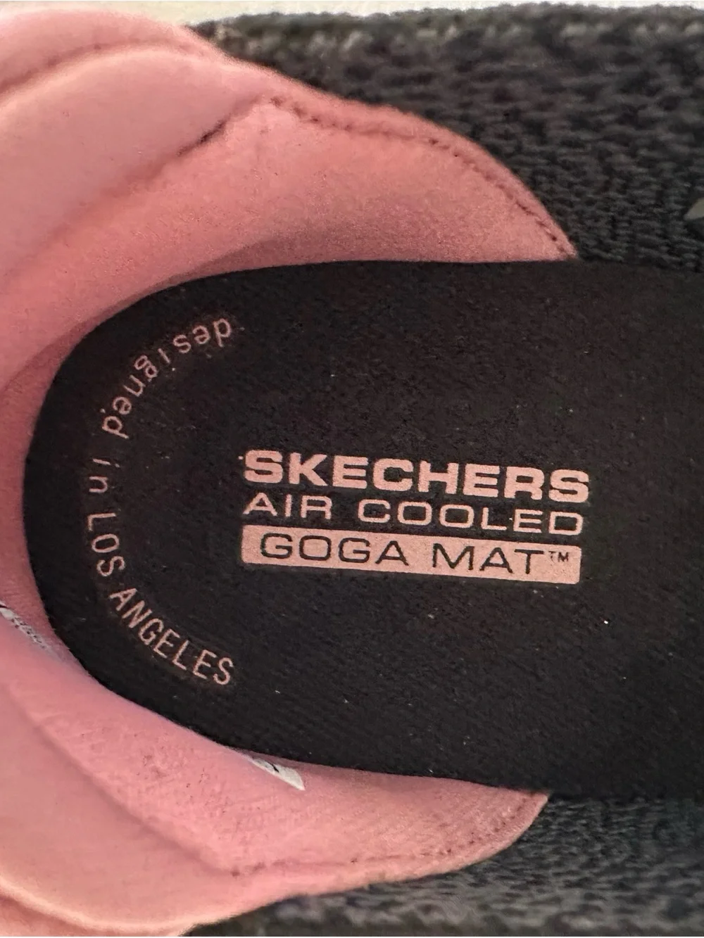 Skechers Women’s Black Glimmer Slip-On Sneakers with Pink Lining